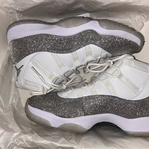 Jordan 11 Retro White and Metallic Silver Sneakers